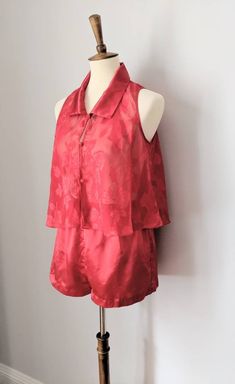 "California Miss red and floral jacquard sheer babydoll top and lounge shorts. Top: 18\" from armpit to armpit 18\" from shoulder to hem Bottoms: 12\" across waist unstretched 16\" across waist stretched I strive to describe each item as accurately as possible. Please check out the photographs, as they are a vital part of the descriptions. Don't hesitate to start a conversation with any questions you might have. All items are sold \"as is\" and are not returnable. Follow us on Instagram: @Vintag Red Summer Sleepwear For Night, Red Summer Sets For Bedtime, Red Bedtime Sets For Summer, Red Sleepwear For Summer Party, Red Summer Party Sleepwear, Red Tops For Pajama Party In Spring, Red Tops For Spring Pajama Party, Red Sleeveless Matching Set, Vintage Pjs