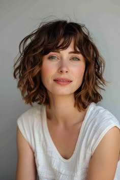 A shaggy bob with fringe is trendy and fun, making it a great mom cut for casual outings. This style adds a playful edge to the traditional bob. Shaggy Bob Short Hair, Short Hair Messy Bangs, Jaw Length Shaggy Bob, Wavy Bob Fringe, Curly Bob Fringe, Short Hair With Bangs Thick Hair, Long Wavy Bob With Bangs, Curly Layered Bob With Bangs, Wavy Bob With Fringe