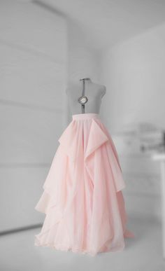 Absolutely gorgeous layered draped blush wedding skirt! Perfect choice for your special day or photo session. I can make it all colors. What you have to send when you place an order: 1. Waist round measurement (cm or inch) 2. Straight line from waist to floor. This is not skirt length. 3. If you want to change the color. 4 Phone number for delivery. NOTE: Real colors can't be 100% same as the pics because of camera and monitor effect! ALL SALES FINAL. This shop is custom shop so when you place a Elegant Pink Prom Skirt, Pink Tulle Evening Skirt, Evening Pink Tulle Skirt, Elegant Pink Tiered Maxi Skirt, Elegant Pink Tulle Skirt, Pink Tiered Skirt For Evening, Pink Tiered Evening Skirt, Elegant Floor-length Ruffled Skirt, Elegant Pink Tulle Maxi Skirt