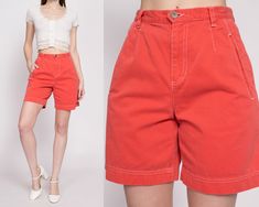 "Vintage 90s high waisted shorts by Liz Claiborne in a salmon soft cotton twill, with contrast stitching. Measurements and Condition:  Fits like: Labeled size 6. Fits slightly petite in the rise, see measurements to ensure fit. Fabric: Cotton Brand: Lizwear by Liz Claiborne Condition: Very good, with a couple tiny faint dark spots on the upper front left, two on the front of the right leg, and one on the back of the right leg. Waist: 26\" Hips: 38\" - taken at the bottom of the zipper opening Ri High Rise Cotton Bermuda Shorts For Summer, High Waist Cotton Bottoms With Contrast Stitching, Summer Cotton Bermuda Shorts With Belt Loops, Trendy Orange Cotton Shorts, Spring Bermuda Shorts With Relaxed Fit And Belt Loops, Spring Bermuda Shorts With Belt Loops And Relaxed Fit, Summer Cotton Bottoms With Contrast Stitching, Spring High-waisted Bermuda Shorts With Belt Loops, Summer Bottoms With Contrast Stitching And Relaxed Fit