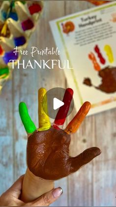 a child's hand made out of chocolate with the words free printable thanksgiving