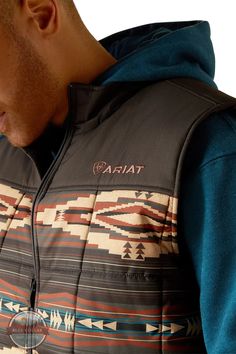 Ariat10052816 Crius Insulated Southwest Pattern Concealed Carry Vest The ultimate year-round layer. As sharp looking as it is high functioning, our Crius insulated vest keeps you warm without adding bulk. Wear it over a button-down or hoodie on days you don't need a jacket—or layer it under a coat for extra protection against the elements. Water resistant Cool Climate Insulation™ for lightweight warmth Embroidered logos Standing collar Zippered hand pockets Interior concealed carry pocket Style# 10052816 Crius Insulated Southwest Pattern Concealed Carry Vest Fitted Outdoor Vest Outerwear, Black Vest For Outdoor Work In Winter, Black Winter Vest For Outdoor Work, Fitted Vest Outerwear For Outdoor Activities, Fitted Winter Vest For Outdoor, Brown Vest Outerwear For Outdoor Activities, Winter Outdoor Work Vest Outerwear, Winter Vest For Outdoor Work, Winter Sleeveless Vest For Outdoor Work