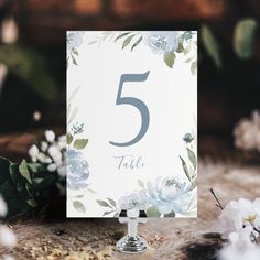 a table number with flowers on it