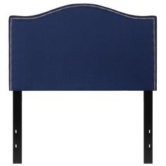 an upholstered headboard with beading on the sides and black wood legs