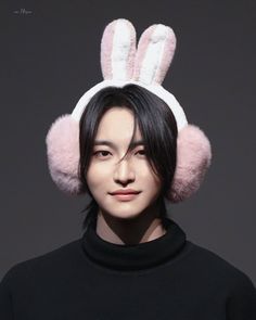 a young man with bunny ears on his head