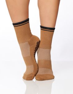 The Koda Sock Introducing Koda, our iconic boyfriend style and chic crew sock. Our new and fun color, Camel, topped with a black cuff to seamlessly pair with leggings. A design that takes you from studio to street, making it the perfect sock for your every move.  Features Extra stick + grip like the honeycomb Performan Socks Street Style, Crew Sock, Discover Card, Fun Color, Fabric Light, Boyfriend Style, Performance Fabric, Crew Socks, Honeycomb