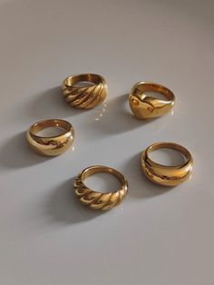 We offer chunky gold rings at affordable prices. Since chunky rings are so popular, I made a special collection for them. Large dome rings, chunky croissant rings, double dome rings, chunky love rings. As a beautiful stainless steel-based gold band, it lasts forever and will always look good. A single ring is stylish enough, but a couple does look very fancy together. ♥ SIGN UP for 10% OFF your first order: https://bit.ly/3olIlWf ♥ DETAILS - Materials: Stainless steel, 18k gold plating. - Nickel Bulky Rings Women, Gold Chunky Rings Aesthetic, Statement Rings Gold, Chunky Jewelry Rings, Gold Thick Ring, Gold Rings Thick, Chunky Gold Rings Vintage, Classy Gold Rings, Thick Rings For Women