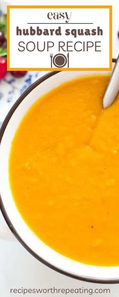 a white bowl filled with carrot soup on top of a table