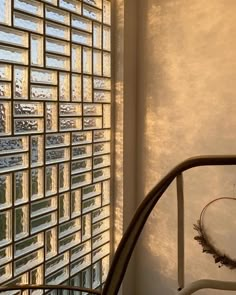 an instagram photo of a glass block wall and railing with the words instagram on it