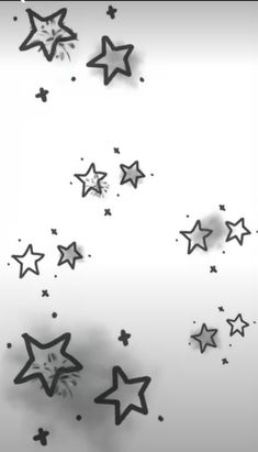 some black and white stars are flying in the air