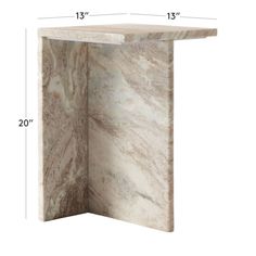 the corner of a marble table with measurements for each side and top, shown in white