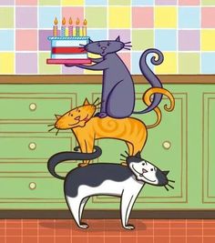 three cats are standing on top of each other in front of a cake with candles