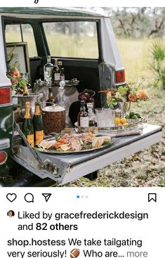 the back end of an old car with food and drinks on it