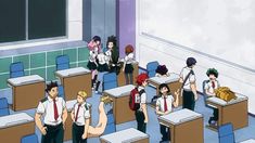 there are many people standing in the classroom