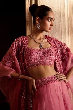 Rose pink pure organza and net lehenga with floral motifs and beaded embroidered waistband. Comes with a blouse and a cape. - Aza Fashions Elegant Pink Evening Choli, Elegant Pink Festive Choli, Elegant Pink Choli With Cutdana, Elegant Pink Cutdana Choli, Pink Bollywood Sharara For Evening, Pink Organza Evening Set, Pink Organza Party Sets, Pink Evening Set With Sheer Dupatta, Pink Party Sets With Intricate Embroidery