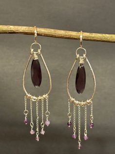 Artisan designed and handcrafted one of a kind chandelier earrings with sterling silver Wire Wrapped teardrop faceted Amethyst, Hammered Sterling Silver Hoop and chains dangling from bottom of the hand forged teardrop hoop with 4 mm amethyst beads Chandelier Earrings.  Total measurement length 4 inches long and width 1 1/4 inches wide including sterling silver leverbacks earring wire. Teardrop Earrings With Dangling Beads, Unique Silver Chandelier Earrings With Dangling Beads, Bohemian Teardrop Silver Plated Wire Jewelry, Artisan Dangle Chandelier Earrings, Silver Teardrop Chandelier Earrings With Natural Stones, Bohemian Teardrop Silver Plated Jewelry, Bohemian Teardrop Pendant Jewelry With Ear Wire, Unique Handmade Long Drop Chandelier Earrings, Bohemian Sterling Silver Teardrop Chandelier Earrings