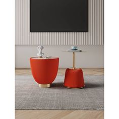 two orange stools sitting next to each other on top of a carpeted floor