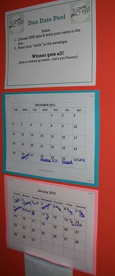 two calendars are hanging on the wall next to each other, with writing on them