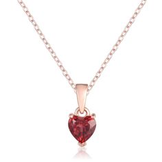 This 14k rose gold over sterling silver heart-shaped pendant features a red garnet center stone and includes a 17 inch chain. Formal Heart Necklace With Birthstone For Valentine's Day, Rose Gold Ruby Jewelry For Valentine's Day, Rose Gold Birthstone Heart Necklace For Valentine's Day, Valentine's Day Rose Gold Heart Necklace With Birthstone, Red Heart Pendant Necklace, Garnet Heart Necklace, Sapphire Heart Necklace, Red Heart Pendant, Heart Jewelry Set