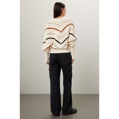 Off-white knit (70% Cotton, 30% Nylon). Sweater. Long sleeves. Crewneck. Pull on. 21" from shoulder to hemline. Imported. White Knit Top For Work In Winter, White Long Sleeve Knit Top For Work, White Pointelle Knit Outerwear, White Long Sleeve Pointelle Knit Outerwear, White Knitted Sweater For Work, White Fall Sweater For Work, Winter White Pointelle Knit Sweater For Fall, Cream Long Sleeve Outerwear With Pointelle Knit, Cream Pointelle Knit Outerwear With Long Sleeves