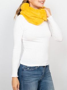 Stay cozy and chic with our vibrant faux fur infinity scarf in pink or yellow, the ultimate accessory for chilly days. Crafted with luxurious faux fur, this infinity scarf adds a pop of color and texture to any outfit, while keeping you snug and stylish. Elevate your winter wardrobe with this must-have accessory, perfect for adding warmth and flair to your look. Yellow Winter Scarves, Warm Infinity Scarf For Winter, Cozy Infinity Scarf For Cold Weather, Stay Cozy, Winter Wardrobe, Infinity Scarf, Must Haves, Faux Fur, Color Pop