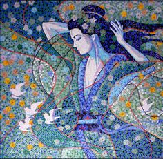 a woman in blue and green is depicted on a mosaic tile wall with birds flying around her