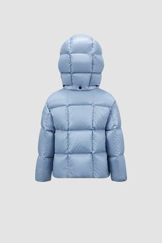 Instantly recognizable, the Parana down jacket is crafted from glossy nylon laqué. Characterized by squared quilting, contrast color lining and a detachable hood, the short puffer is a practical piece that goes from the school yard to the playground. Blue Hooded Duck Down Puffer Jacket, Blue Duck Down Puffer Outerwear, Blue Nylon Puffer Jacket With Detachable Hood, Blue Down Puffer Jacket With Detachable Hood, Blue Down Puffer Jacket, Blue Nylon Puffer Jacket With Padded Collar, Blue Hooded Puffer Jacket With Detachable Hood, Luxury Blue Puffer Jacket For Winter, Luxury Blue Winter Puffer Jacket