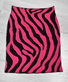 Hot pink zebra jacquard  weaving tulip skirt. It has a tight and full texture. A little flexible. Self belt. There is elastic string on the belt part. stretches while wearing and wraps around the waist again Avaible color in other colors Size: all nonstrech Belt height: 5cm / 1.9 inch waist width: 34cm / 13.4 inch full lenght: 50cm / 19.5 inch Hip : 40cm / 15.7 inch Hem width: 43cm / 17 inch Zebra Skirt, Pink Zebra Top, Pink Zebra Print Skirt, Zebra Print Skirt, Hot Pink Zebra, Animal Print Skirt, Tulip Skirt, Pink Zebra, Knit Skirt