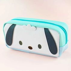 Use this cute pen case to organize your pencils, erasers, markers, and other things. It showcases a lovely die-cut Pochacco design!  Features a zipper closure Kawaii Rectangular Pencil Case With Zipper Closure, Blue Kawaii Pencil Case With Pen Holders, Cute Rectangular Pencil Case For Back To School, Cute Blue Pencil Case With Pen Holders, Cute Green Pencil Case With Pen Holders, Cute White Pencil Case With Pen Holders, Cute Green Zipper Pouch Pencil Case, Cute Back To School Craft Supplies With Pen Slots, Cute Rectangular Pencil Case For Everyday Use