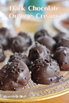 dark chocolate orange creams on a glass plate