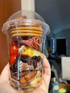 a plastic container filled with lots of different types of food in it's lid