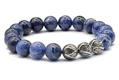 The Sodalite bracelet's high appeal is a result of both the stacked arrangement of the layers and the delicate play with colors.  It is a magnificent work of art that features tons of personality and makes for a cheerful outlook on life This unique bracelet contains high-grade, smooth, round, excellent luster and polish 10 mm Sodalite. 10 mm stainless steel. Sodalite is a deep blue stone with light white veins, reminiscent of a dark stormy ocean.  Strung on a hard black stretch cord for increased strength and durability.  Each piece comes in a delicate pouch. These bags are ideal to preserve the jewel in perfect conditions and are the ideal wrap to present as a gift to that special person. Please contact me via Etsy Conversations with any questions. I love to hear from you! I send the pack Stormy Ocean, Sodalite Bracelet, Lampwork Bracelets, Black Onyx Bracelet, Energy Bracelets, Blue Sodalite, Crystal Healing Bracelets, Onyx Bracelet, Natural Stone Bracelets