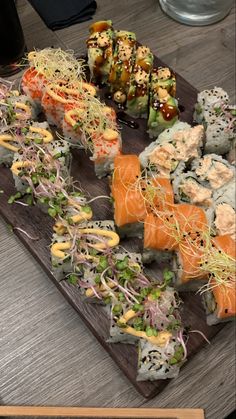 sushi platter with various types of food on it