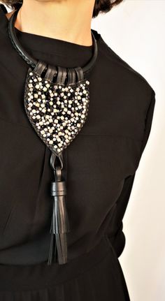 Luxury Black Leather Beaded Bib Necklace, Long Tassel Ethnic Choker Necklace, Bold Tribal Necklace, Crystal Chunky Statement Necklace, Aesthetic Necklace, Bohemian Jewelry, Mothers Day Gift, Necklace Women Modern necklace for a special woman. ✴WOULD YOU LIKE TO HAVE A STRIKING ACCESSORY TO ELEVATE YOUR LOOK IN A SINGLE GESTURE? This accessory will add value to the casual, most neutral looks and also more elaborate compositions and allow them to be elevated to another level. This is a one-of-a-ki Aesthetic Necklace, Necklace Aesthetic, Black Leather Necklace, Beaded Bib Necklace, Modern Necklace, Long Statement Necklace, Tie Necklace, Chunky Statement Necklace, Luxury Necklace