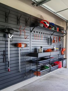 a garage with tools hanging on the wall