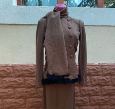 The item is in great condition Fitted Brown Long Sleeve Sets, Brown Winter Office Suits, Brown Long Sleeve Winter Sets, Long Sleeve Brown Sets For Fall, Brown Long Sleeve Sets For Fall, Fitted Single Breasted Brown Set, Elegant Beige Winter Clothing Set, Elegant Beige Winter Set, Fitted Brown Single Breasted Set