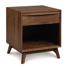 a wooden night stand with one drawer open