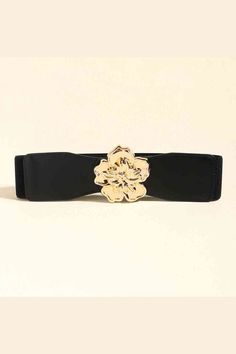 Experience the perfect blend of fashion and functionality with our Flower Alloy Buckle Elastic Belt. The trendy design of the flower alloy buckle adds a touch of elegance to any outfit, while the elastic belt provides a comfortable and adjustable fit. Look and feel your best with this must-have accessory! Material: alloy Imported Product measurements: Length: 28.7 in Width: 2.4 in Buckle: 3.1 in Adjustable Belt For Formal Occasions In Spring, Adjustable Formal Belt For Spring, Spring Party Fabric Belt, Elegant Gold Belt For Spring, Spring Formal Adjustable Belt, Adjustable Gold Fabric Belt, Elegant Adjustable Belts For Spring, Gold Adjustable Belt For Spring, Elegant Spring Fabric Belt