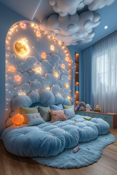 a bedroom with blue walls and white clouds on the headboard is lit up by fairy lights