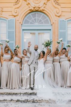 the bride and groom with their bridal party in front of an old building that says choose your bridesmaids with us