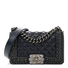 This is an authentic CHANEL Glazed Calfskin Quilted Small Boy Chained Flap in Navy. This chic and structured shoulder bag is finely crafted of distressed leather with signature diamond stitched quilting. The bag features an aged silver ruthenium chain link shoulder strap with a leather shoulder pad and a ruthenium facing Chanel Boy CC push lock.  The facing flap opens to a fabric interior with a flat pocket. Designer Leather Bag With Chain Detail, Designer Leather Bag With Chain, Designer Leather Bags With Chain Detail, Structured Shoulder, Small Boy, Diamond Stitch, Chanel Boy, Distressed Leather, Shoulder Pads