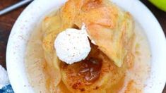 an apple pie is topped with whipped cream