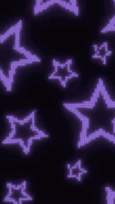 purple stars are arranged in the shape of an x - ray pattern on a black background