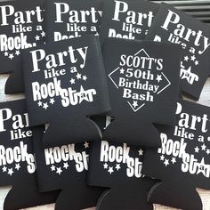 black and white party coasters are laid out on a wooden table with the words party like rock'n'roll printed on them