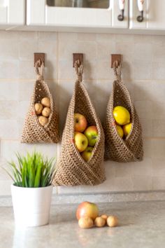 Hanging wall baskets with beautiful loops is a perfect rustic kitchen decor.
Add a beautiful, natural touch to your home with this jute hanging basket!
Perfect for storing vegetables, fruits and other things, this basket is made from 100% natural jute and is sure to add a unique charm to your space.
With a strong natural jute twine you can be sure that this basket will last for years to come. Get yours today and start organizing in style! Crochet Jute Basket, Hanging Wall Baskets, Crochet Jute, Farmhouse Basket, Basket Wall Hanging, Hanging Fruit Baskets, Rustic Baskets, Jute Hanging, Basket Kitchen