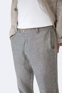 Feel the ease and elegance of the Comfy Classics Linen Pants. These pants have a relaxed fit with belt loops, a zipper, a two-button closure, and ample pocket space. Great for both casual and semi-formal events, they offer a timeless look and breathable comfort. Product Details: * Material: 100% Natural Linen * Fit: Regular * Closure: Zipper and two-button closure * Pockets: Two side pockets and two back pockets * Details: Belt loops for versatile styling * Care Instructions: Machine washable on Summer Chinos Trousers With Belt Loops, Summer Chinos With Belt Loops, Summer Tapered Leg Chinos With Belt Loops, Pockets Details, Mens Linen Pants, Striped Trousers, Mens Linen, Casual Stripes, Pants Casual