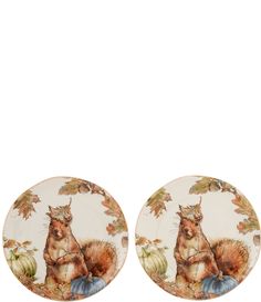 two plates with cats on them sitting next to each other in front of a white background