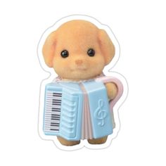 a small stuffed animal with an accordion in its hand and music notes on it's chest