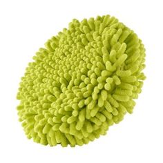 a green sponge on a white background