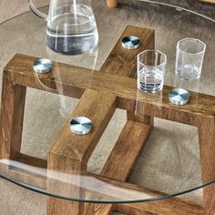 a glass table with some glasses on it